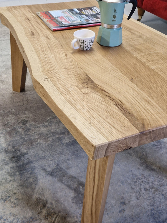 oak Scandi style coffee table, made in Dublin Ireland, tapered oak legs, live edge character oak, cosy Scandinavian design, warm tones